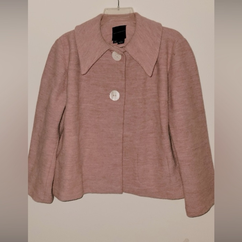 Vintage jacket, size small, pure wool, color is pink, made in England.